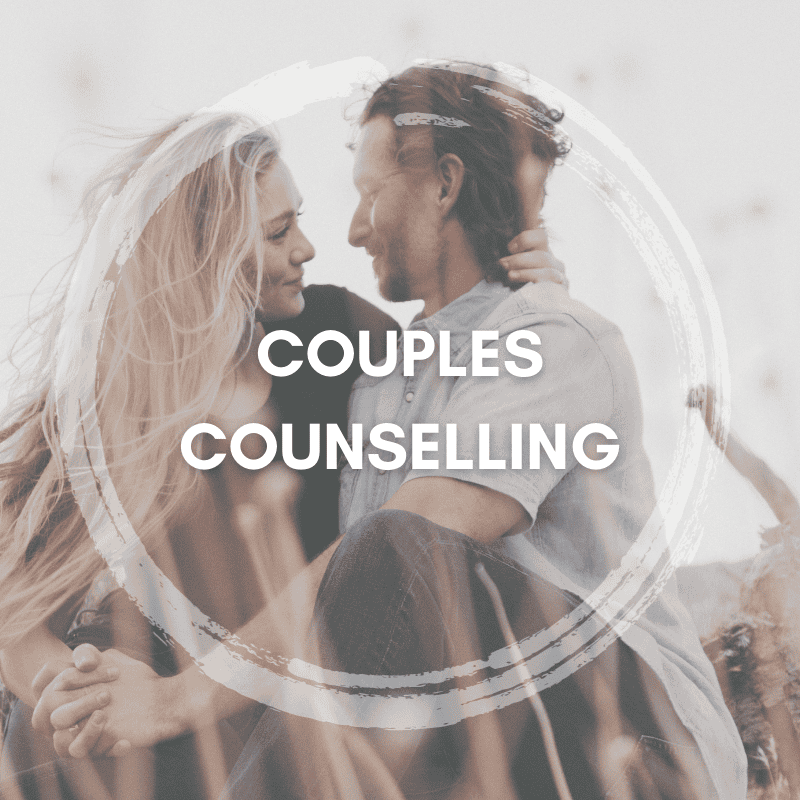 Happy couple embracing in a field, representing successful couples counselling at Strength Counselling Services.